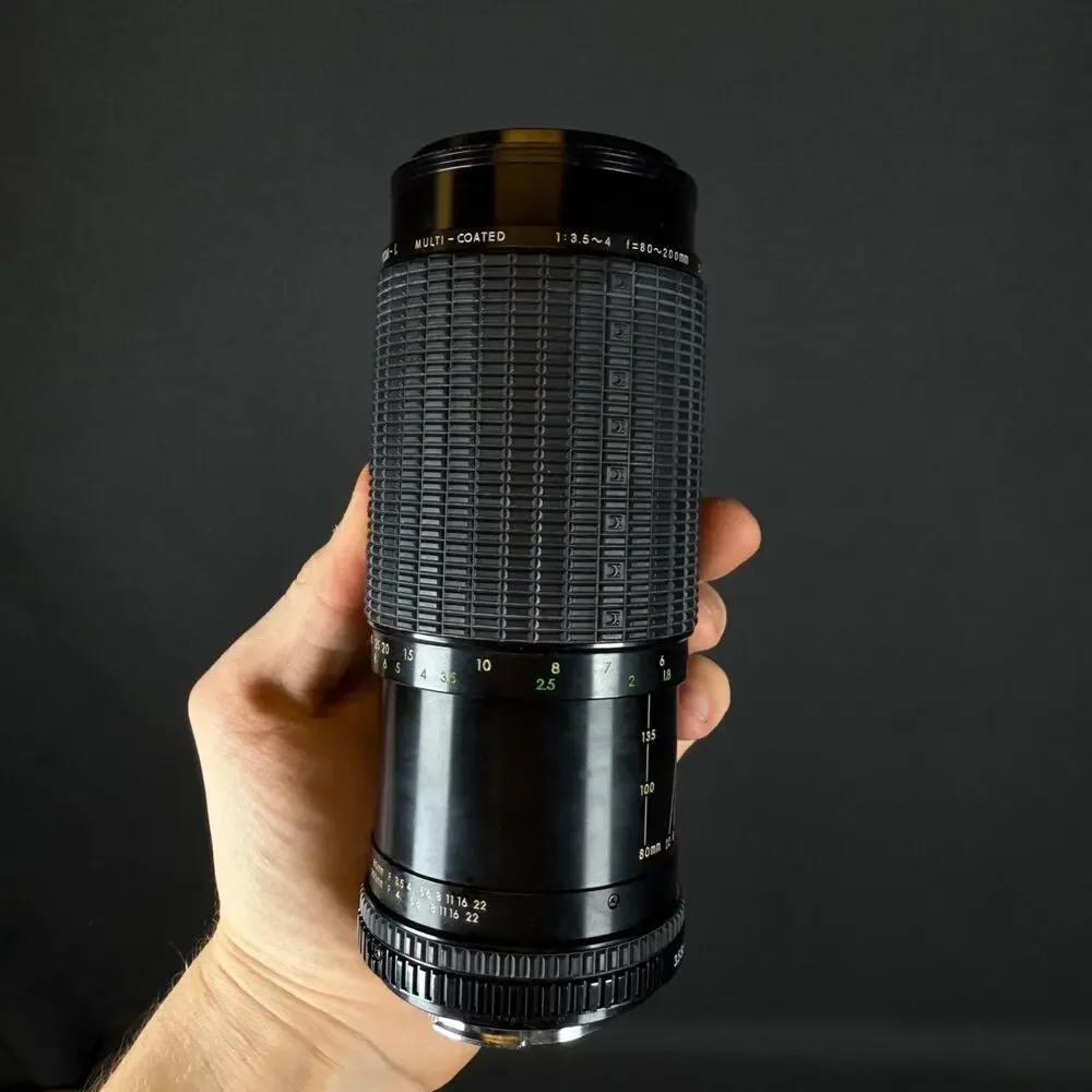 Sigma High-Speed Zoom-C 80-200mm 3.5-4 with case and lenses